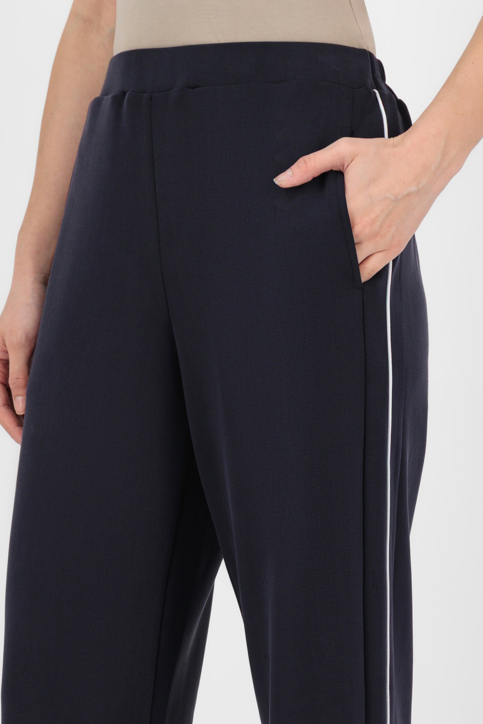 Close-up of the Buttery Straight Leg Jogger Midnight Blue showing the soft fabric, waistband detail, and clean stitching that define these refined straight leg pants.