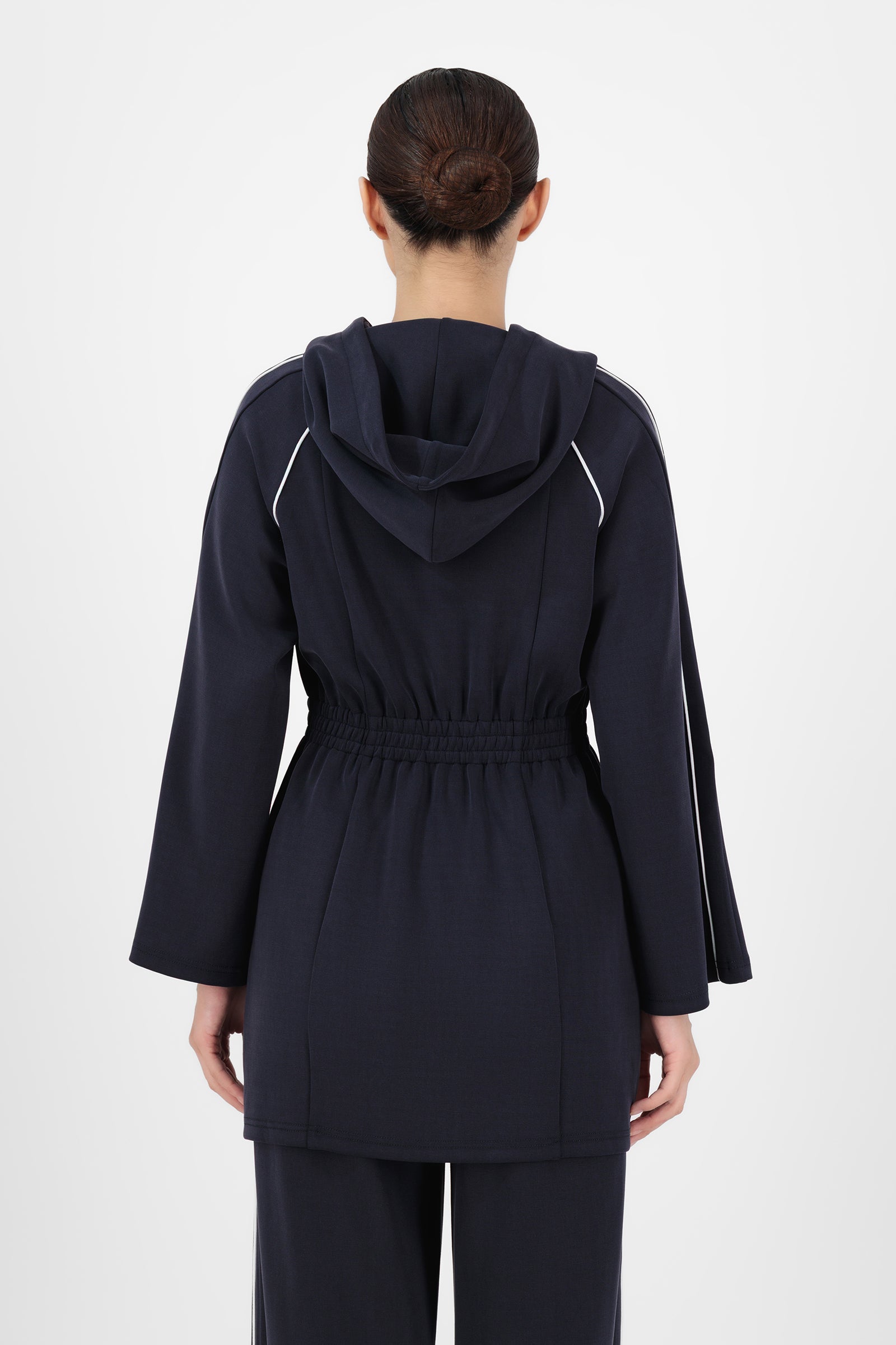 Back view of the Midnight Blue Buttery Contrast Detail Hoodie highlighting the relaxed shape and smooth finish that keep these hoodies looking polished and effortless.