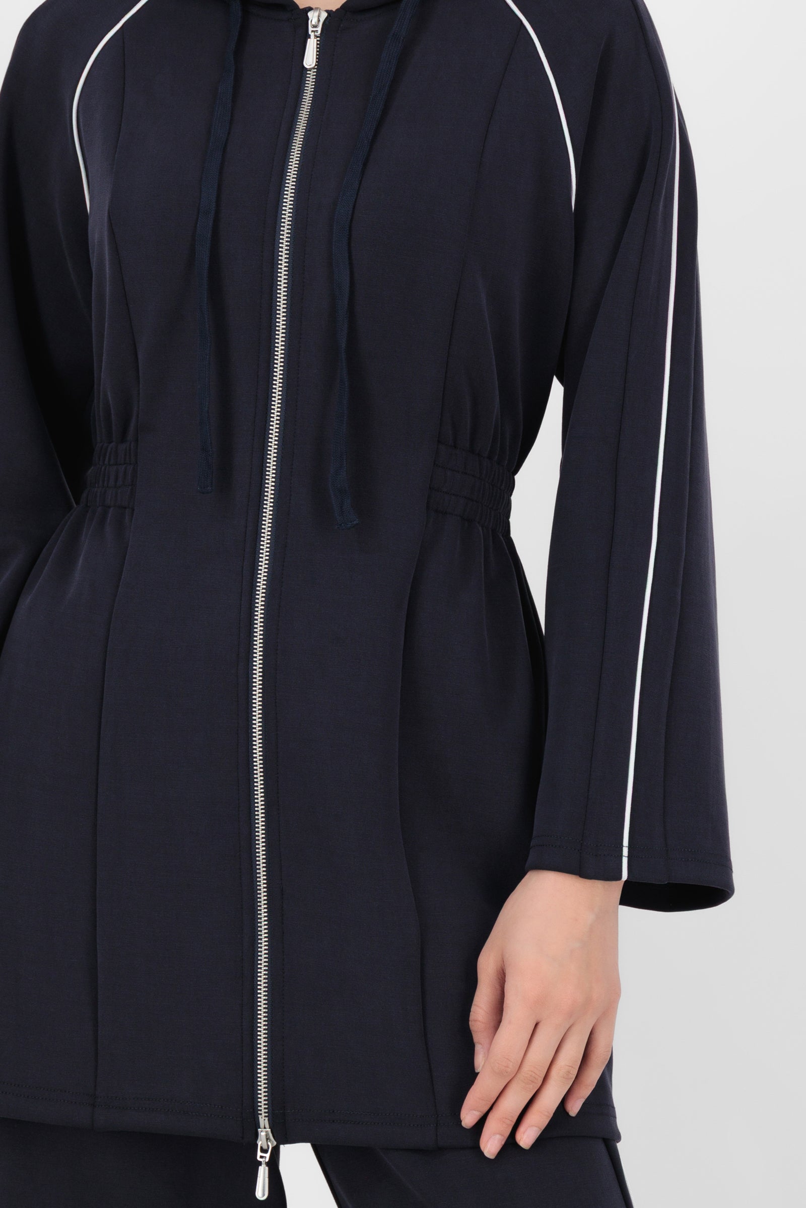 Close-up of the Buttery Contrast Detail Hoodie Midnight Blue showing the contrast stitching, soft texture, and quality finish that define elevated hoodies for women.