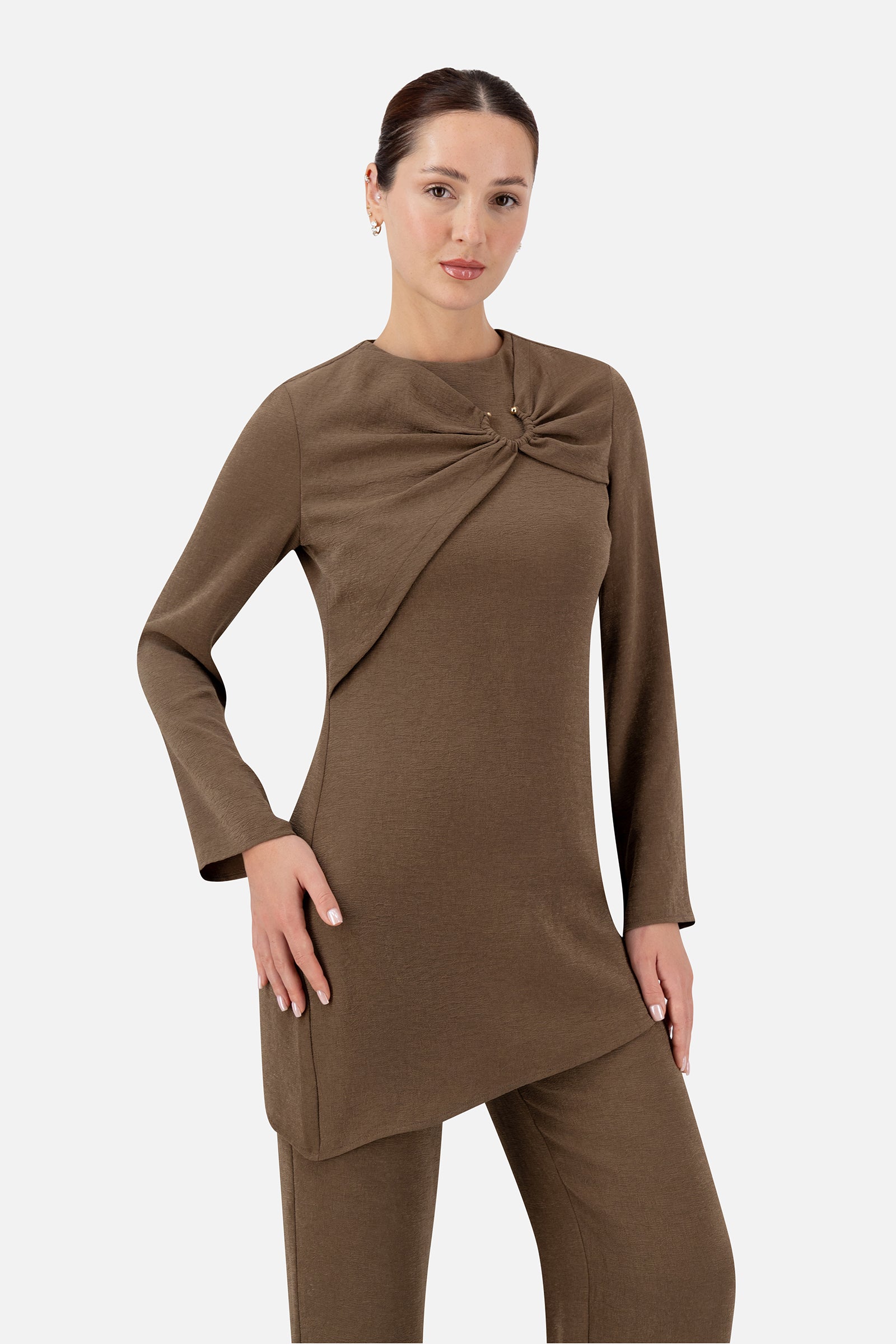 Woman standing in the Espresso gathered ring tunic with matching pants.