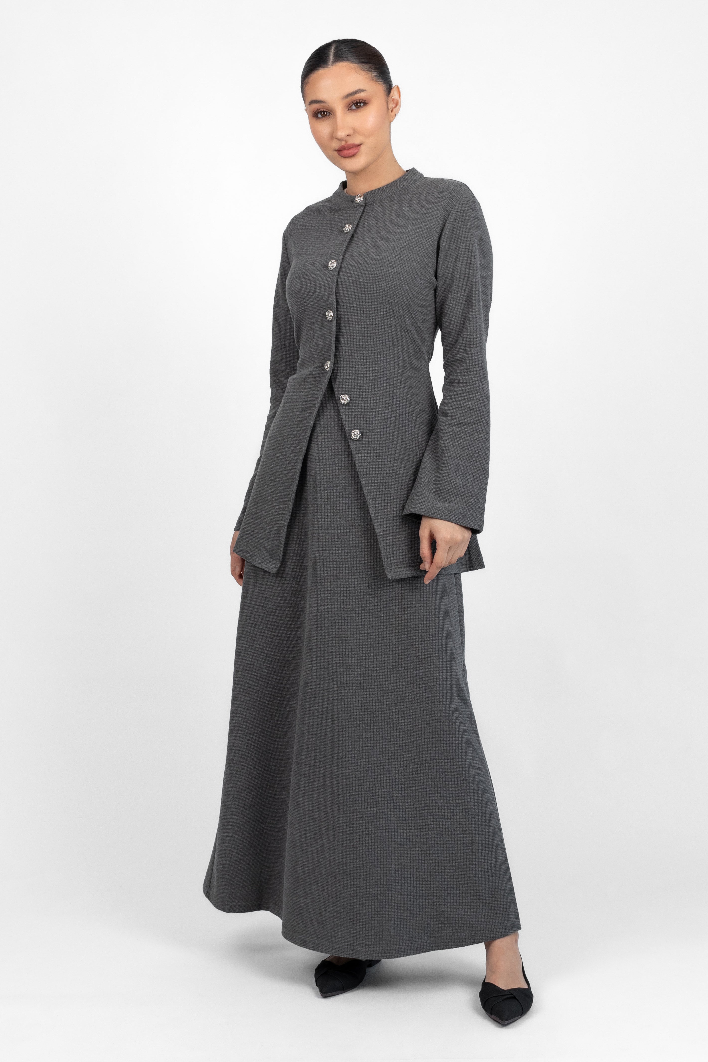 A front pose of a model in a Tailored Vintage Cardigan.