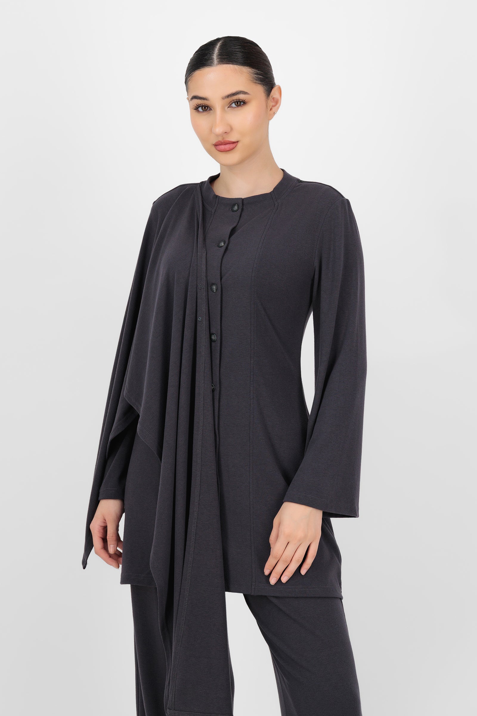 Alternate front pose of the Charcoal Draped Shawl Knit Top showing the gentle wrap-like shape and comfortable fit that elevate this style within knit tops.