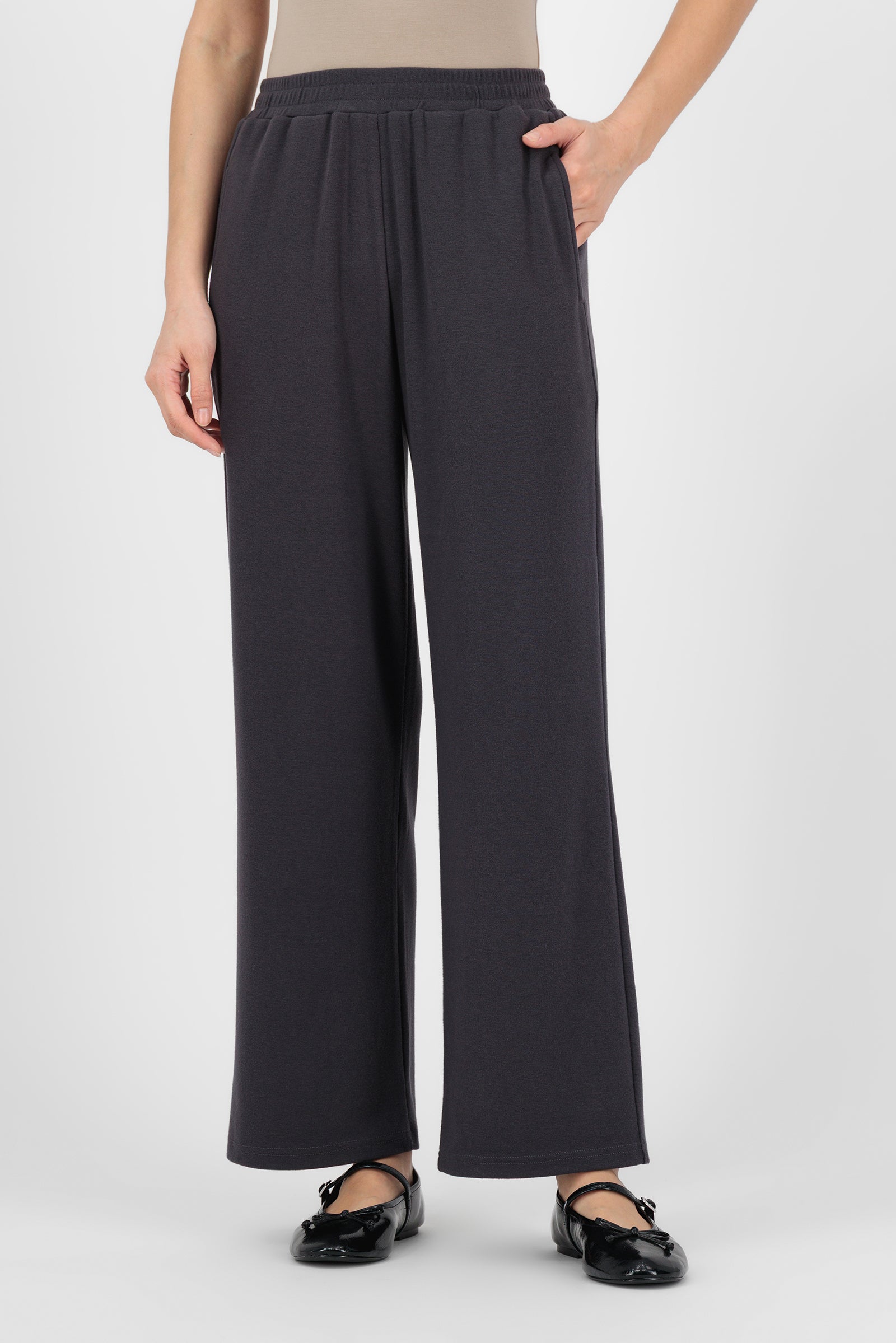 Model wearing the Straight Leg Knit Pants in Charcoal front view, showing the clean straight silhouette and soft knit texture that make these knit pants a comfortable everyday staple.
