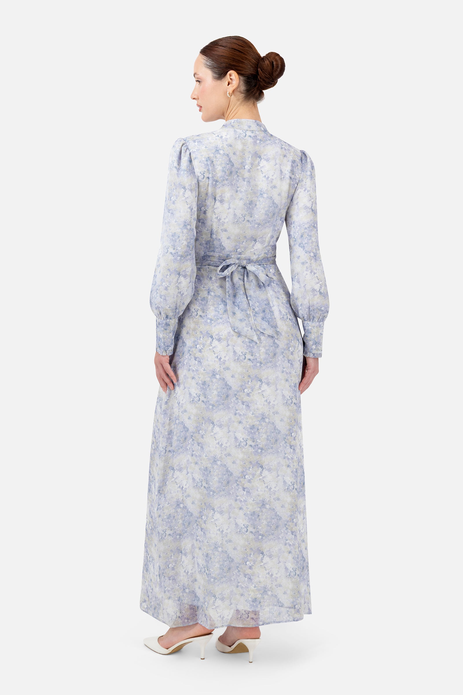 Back view of the Blue Dreams printed dress showcasing the elegant full-length design.