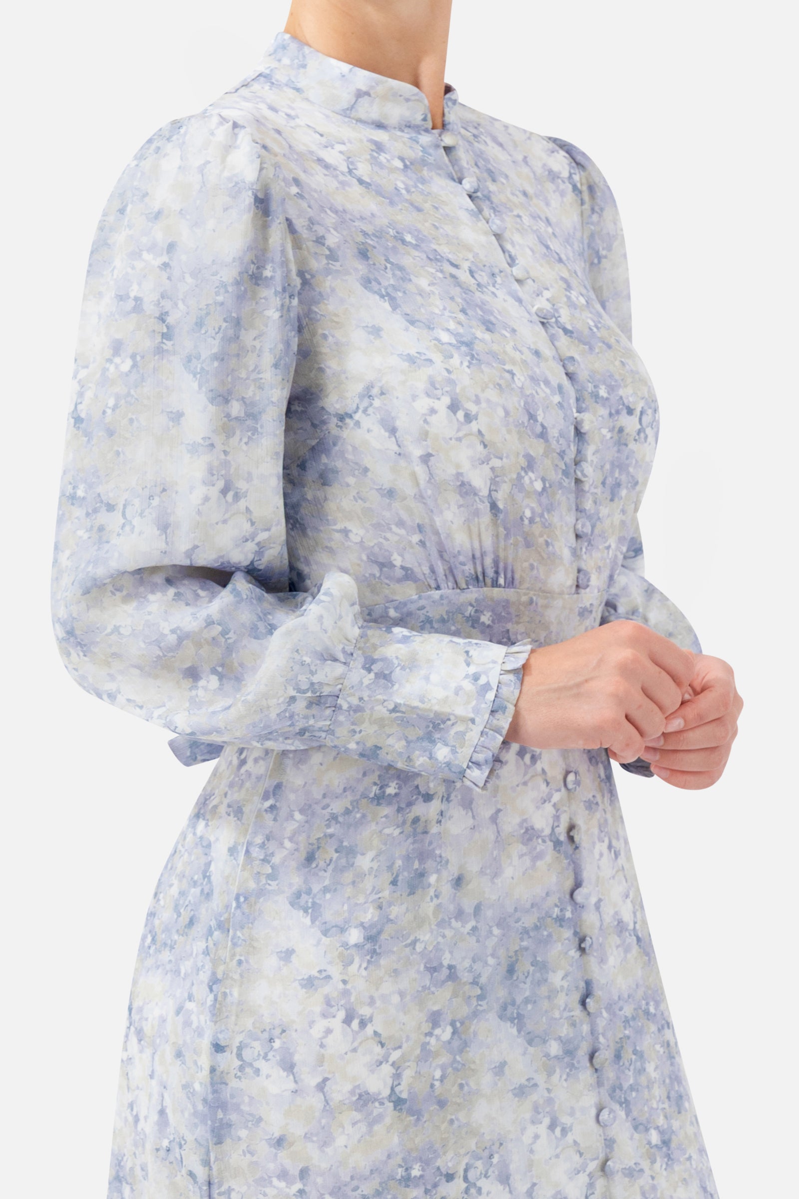 Close-up of the vintage-inspired print and neckline detail on the Blue Dreams printed dress.