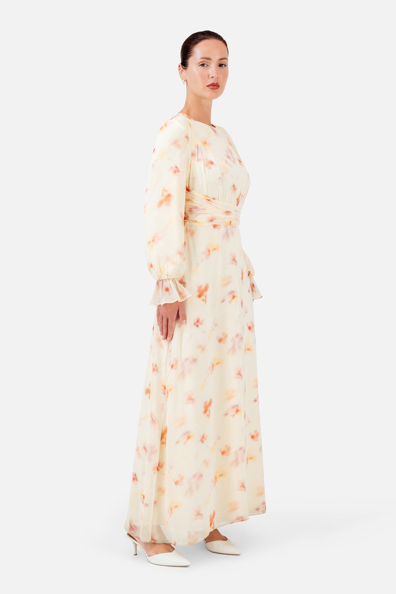 FARES Waist Wrap Chiffon Dress in Sunbloom shown from the side, featuring the lightweight drape of this elegant dress for women.