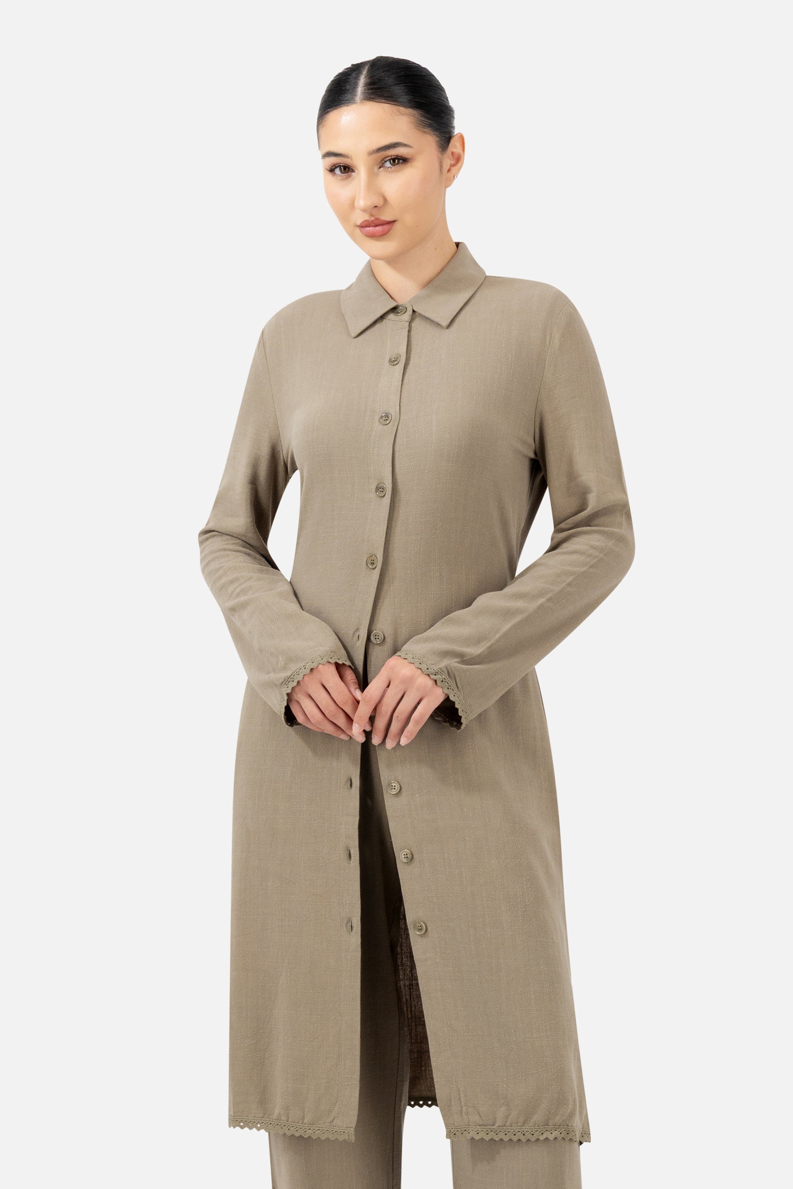 Woman wearing the Haze Lace Trim Longline Button-Up, front view with a longline silhouette and delicate lace trim.