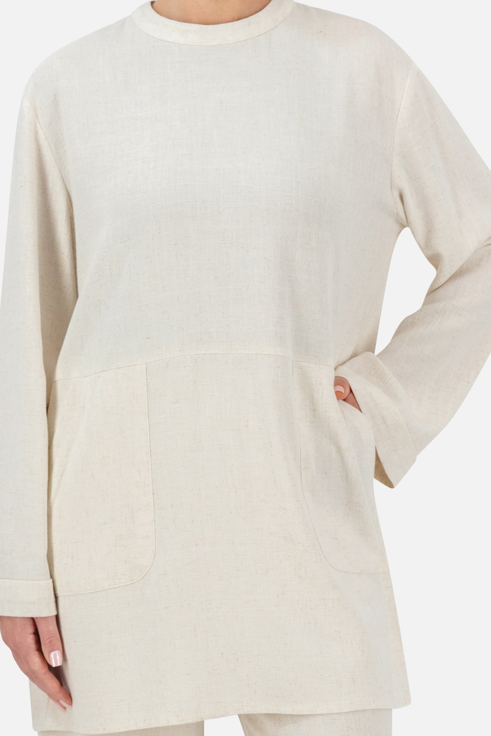 Close-up of the lightweight linen fabric and round neckline on the Vanilla top.