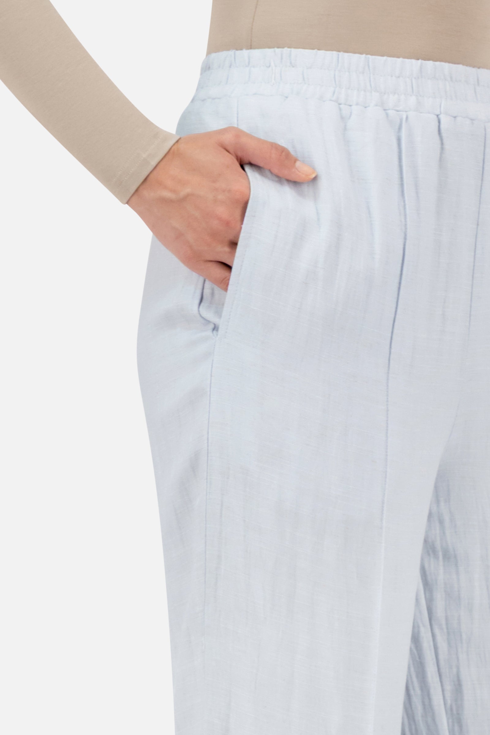 Close-up of the FARES Straight Leg Flowy Pants in Blueberry Cream featuring the soft texture and refined seam detailing of the straight leg pants.