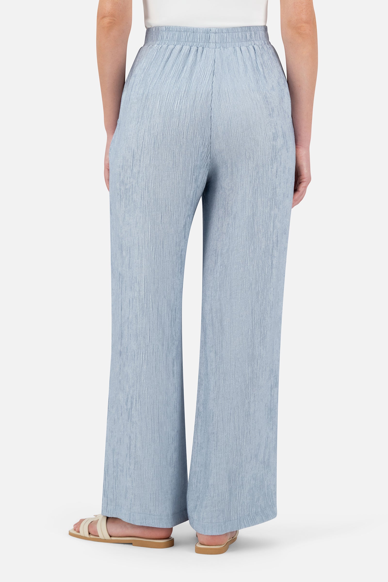 Back view of the Icy Blue relaxed fit pants showcasing the textured rippled fabric.