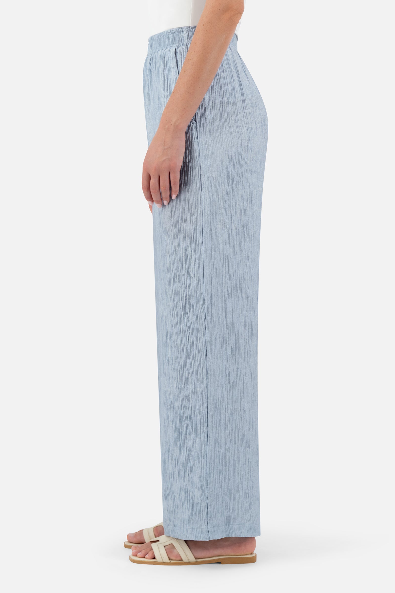 Side profile of the Icy Blue pants for women highlighting the relaxed and comfortable fit.