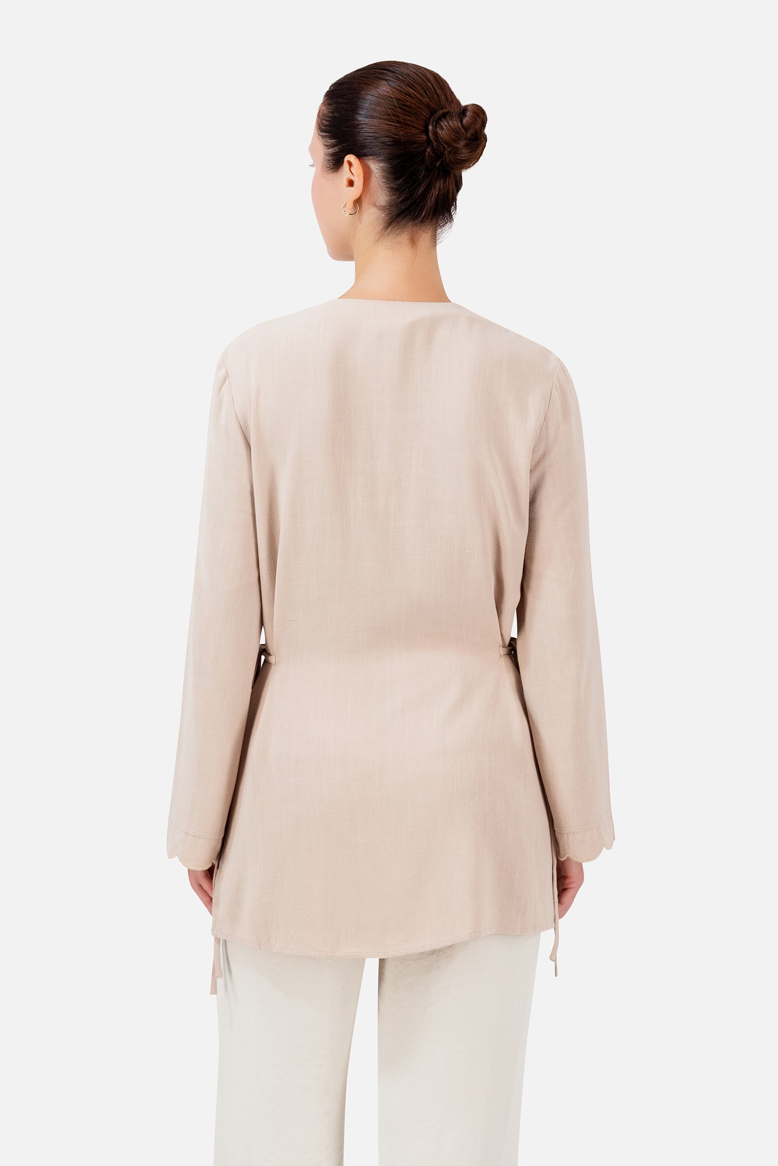 FARES Scalloped Detail Linen Blend Top in Shell shown from the back, highlighting the relaxed longline shape and softly structured silhouette.