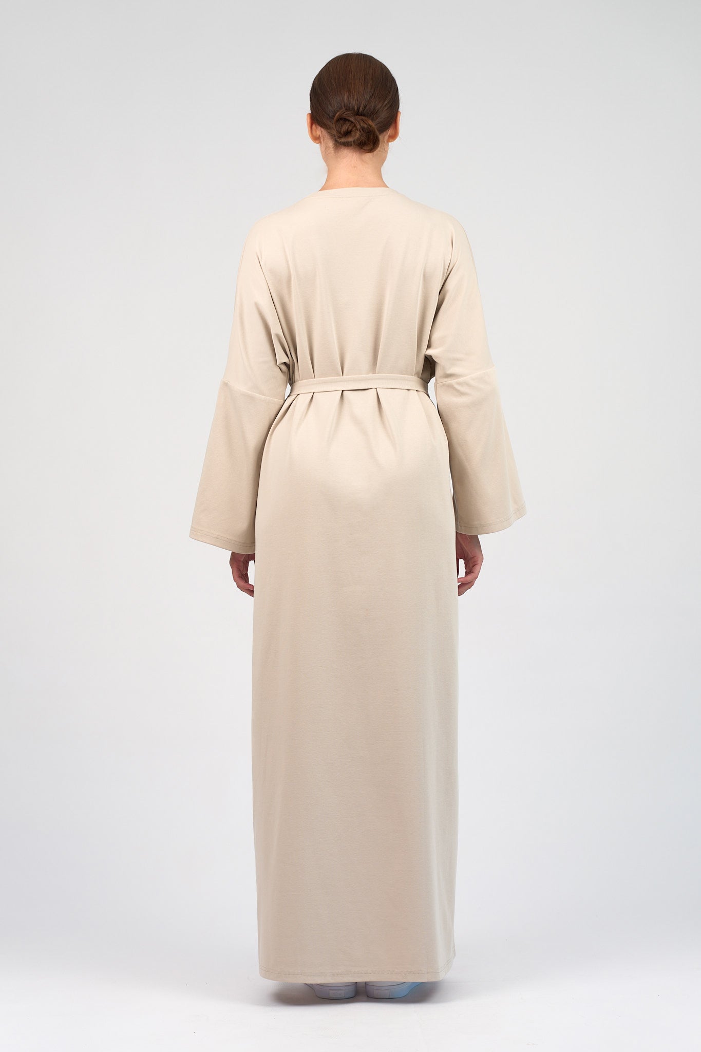 Colour: Mink. A girl from the back in a Cotton Maxi Dress