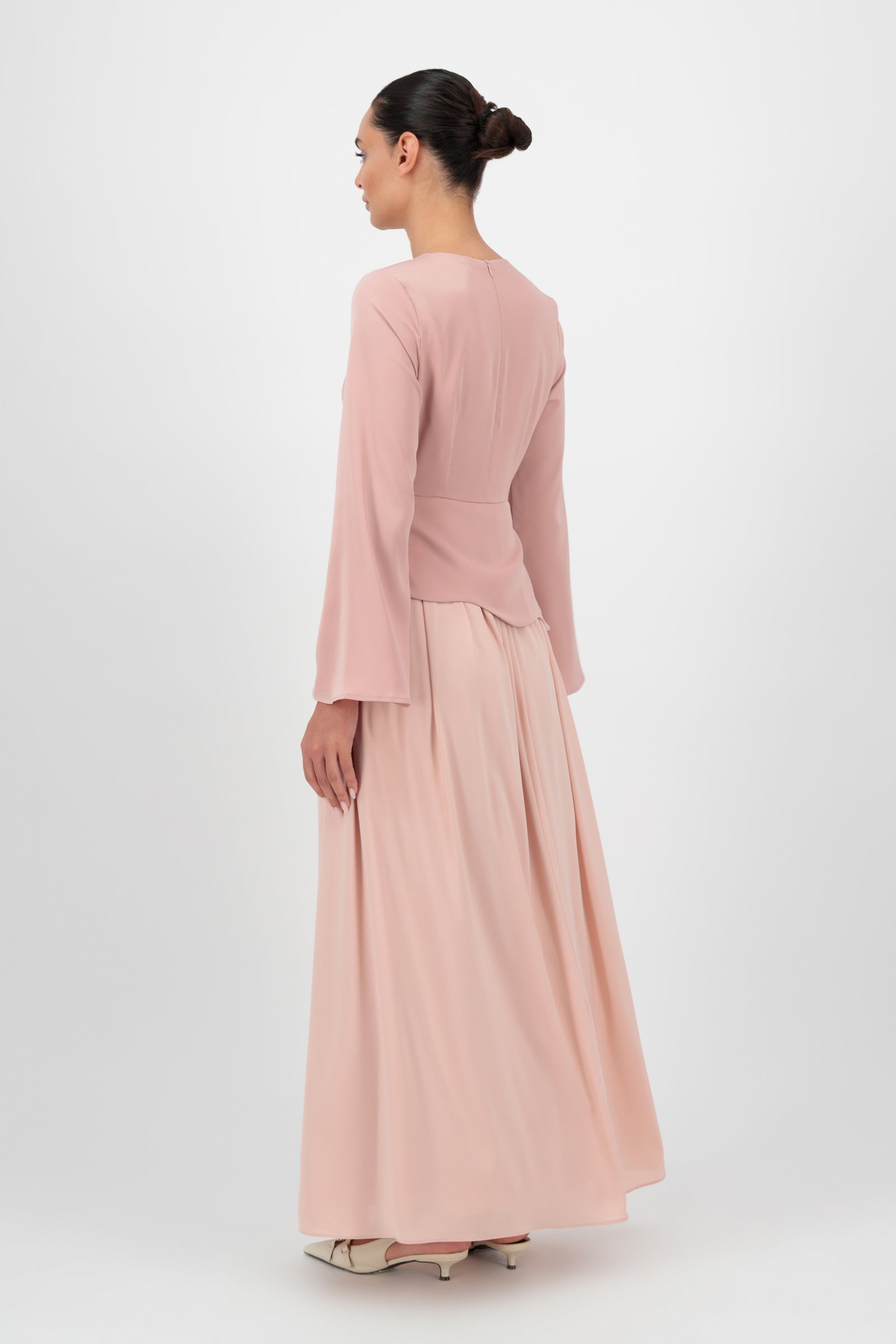 Back view of the FARES Two Tone Scalloped Peplum Dress in Farawla showcases the clean tailoring and graceful drape that elevate this timeless dresses for women design.