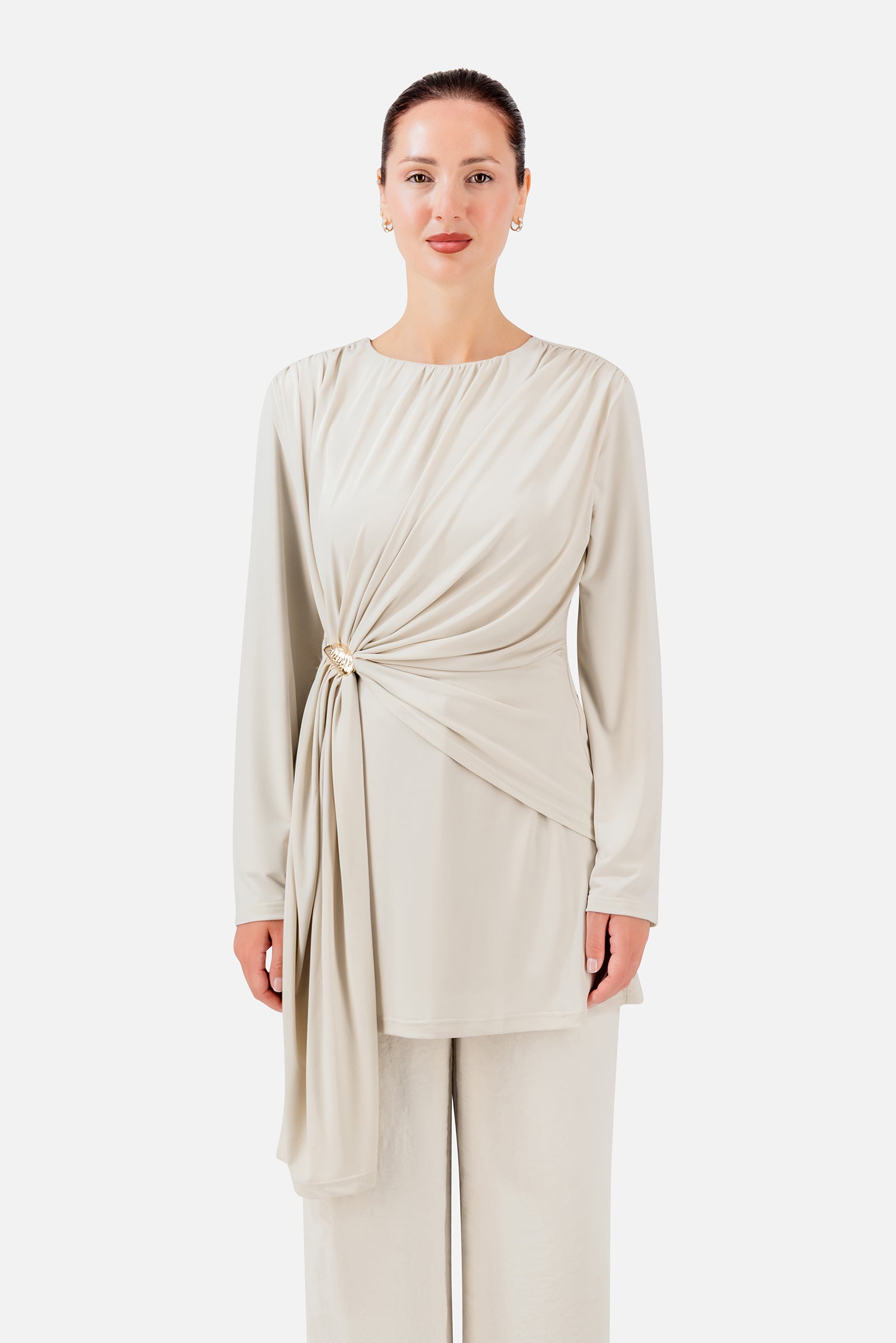 FARES Side Draped Tunic in Vanilla Cream, an elegant piece of tunic clothing with soft draping gathered beautifully at the side.