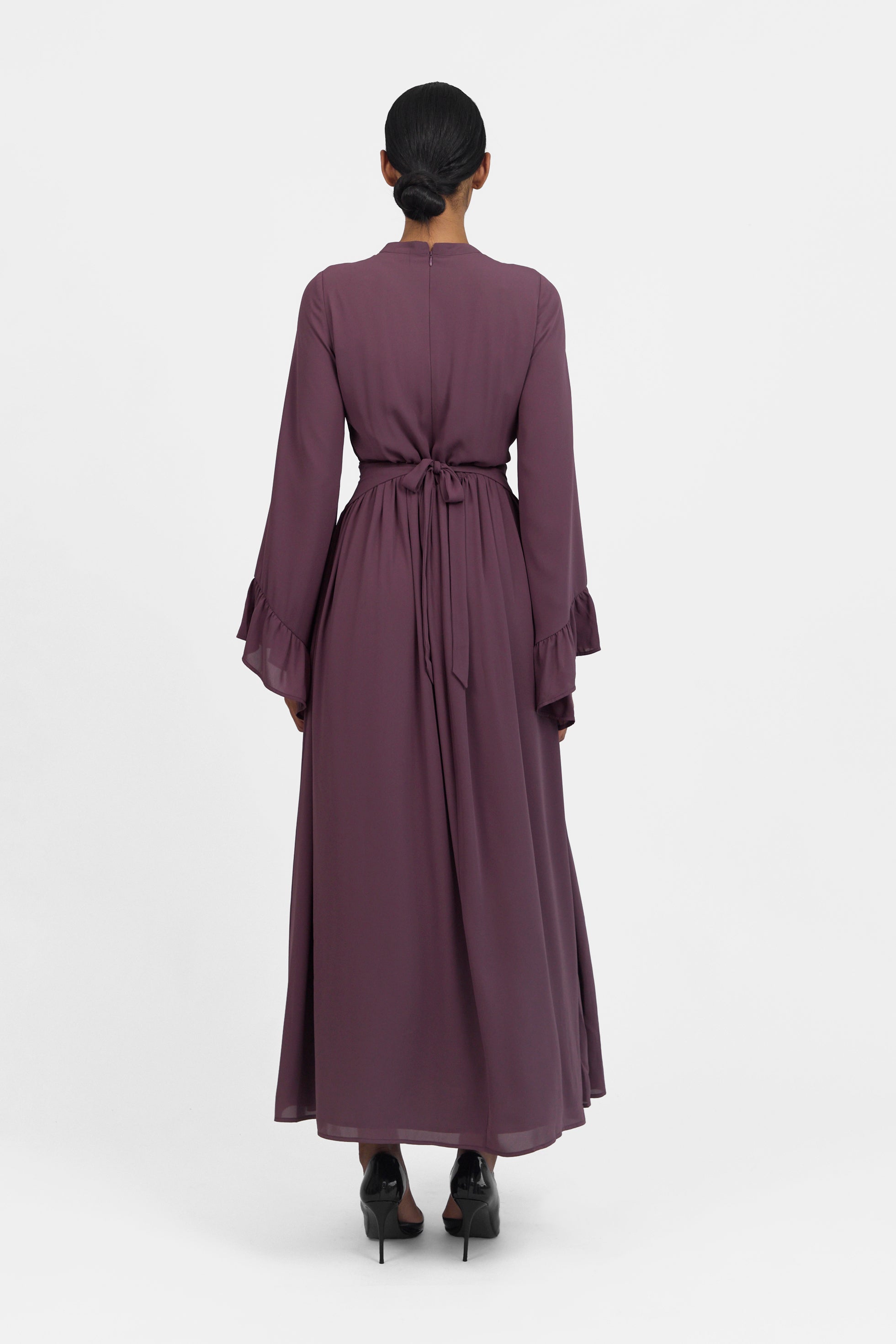 A back pose of a model wearing Butterfly Sleeve Chiffon Dress 	Colour: Fig