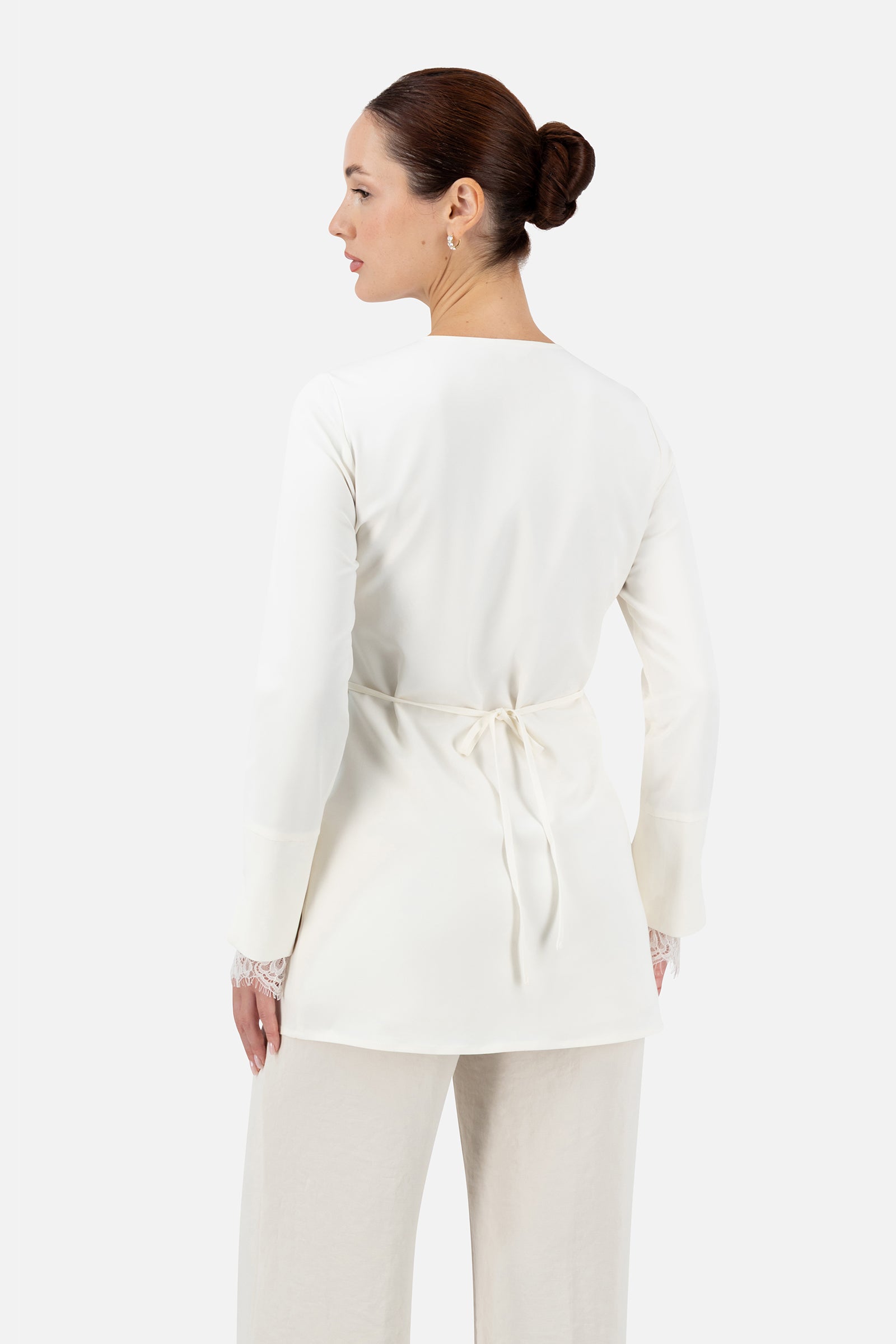 Back view of the Sugar button-up long-sleeve top showing the lace detail.