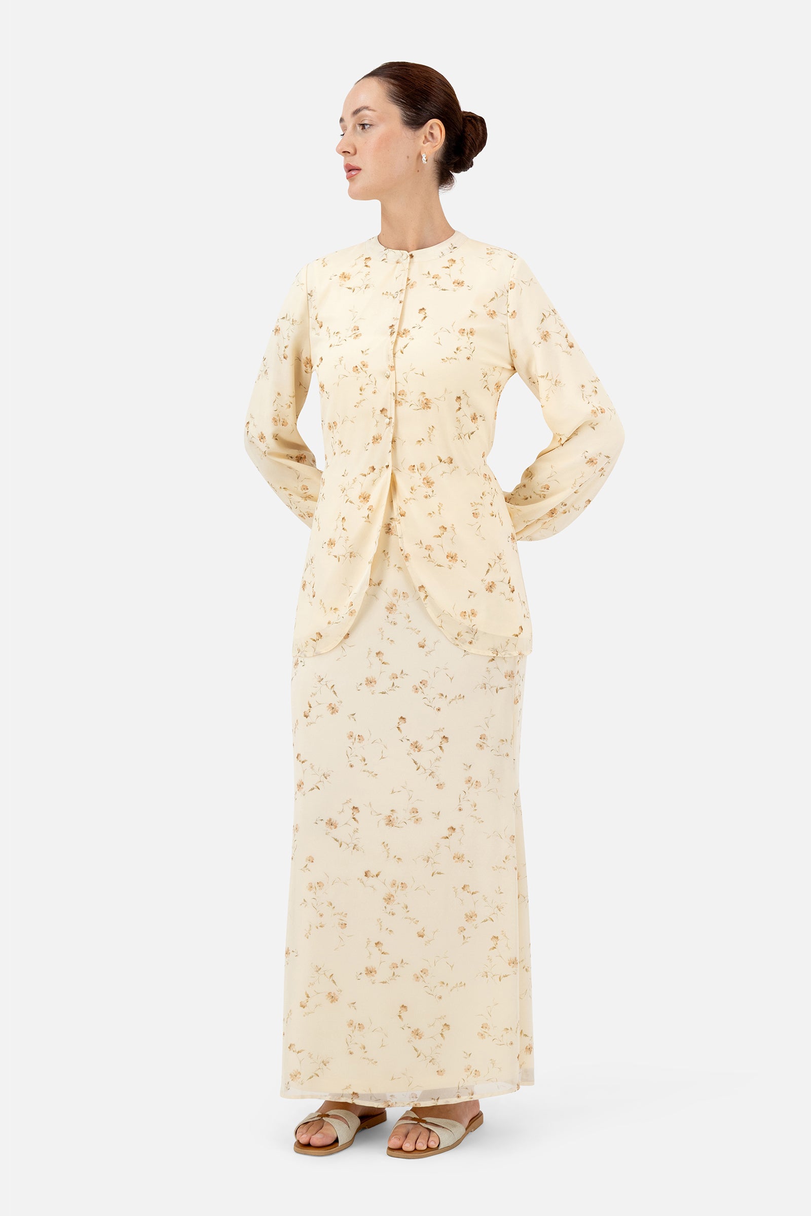 Full-length view of the model wearing the Butterbloom maxi skirt as part of a coordinated outfit.