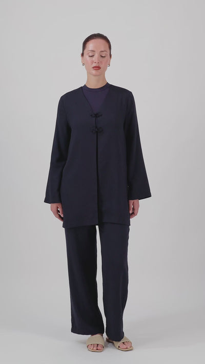 Video of the FARES Relaxed Fit Pants in Navy, showing the comfortable fit and natural movement of these pants for women.