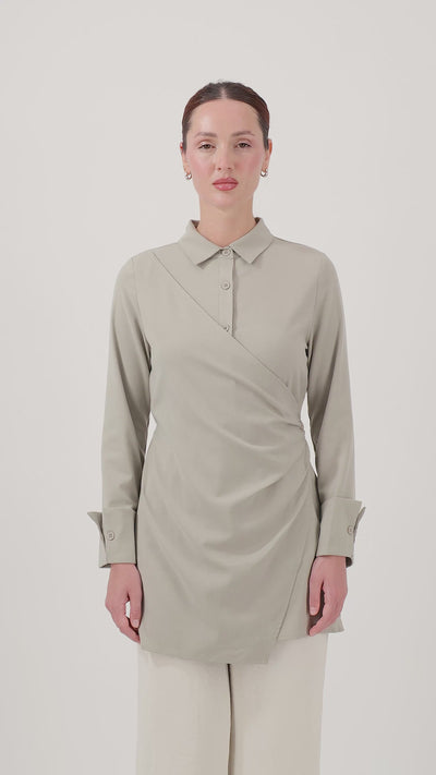Model presenting the Antique Green Wrap Detail Button-Up Shirt with effortless movement and a flattering fit.