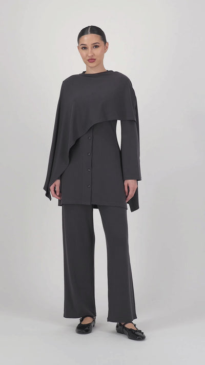 Video of the model moving in the Straight Leg Knit Pants Charcoal, highlighting the smooth movement and flattering straight leg pants silhouette.